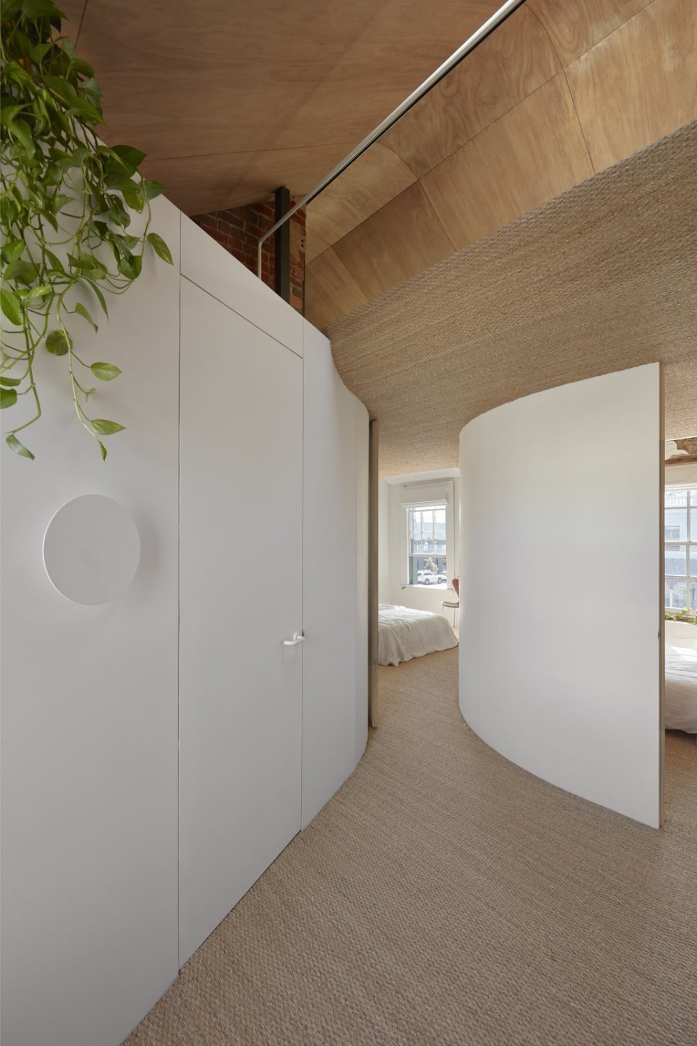 Bedroom with curved walls.<span class="sr-only"> (opened in a new window/tab)</span>
