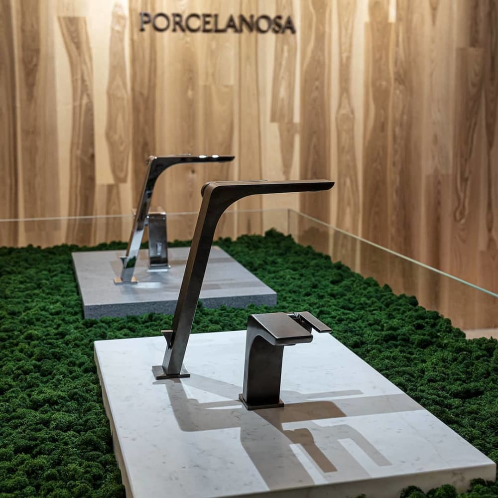 Faucets displayed on a stone slab laid on top of a layer of moss.<span class="sr-only"> (opened in a new window/tab)</span>