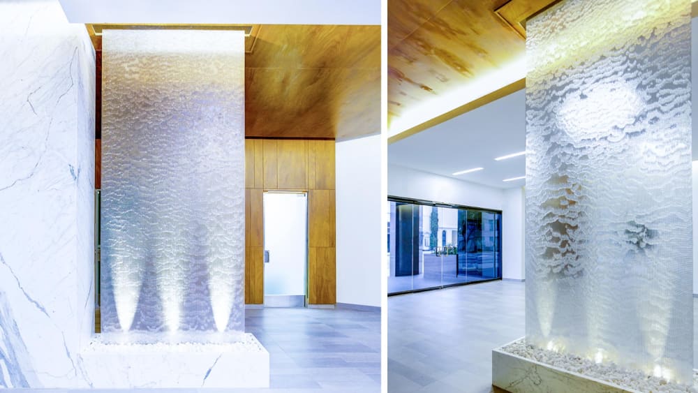 Indoor water wall acting as a room divider.<span class="sr-only"> (opened in a new window/tab)</span>