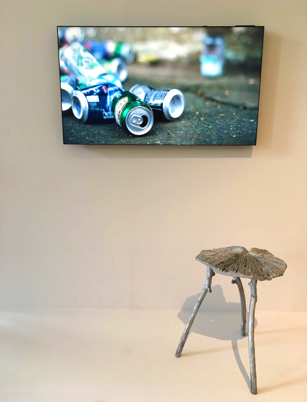 Photo of a stool made with recycled aluminum cans.<span class="sr-only"> (opened in a new window/tab)</span>