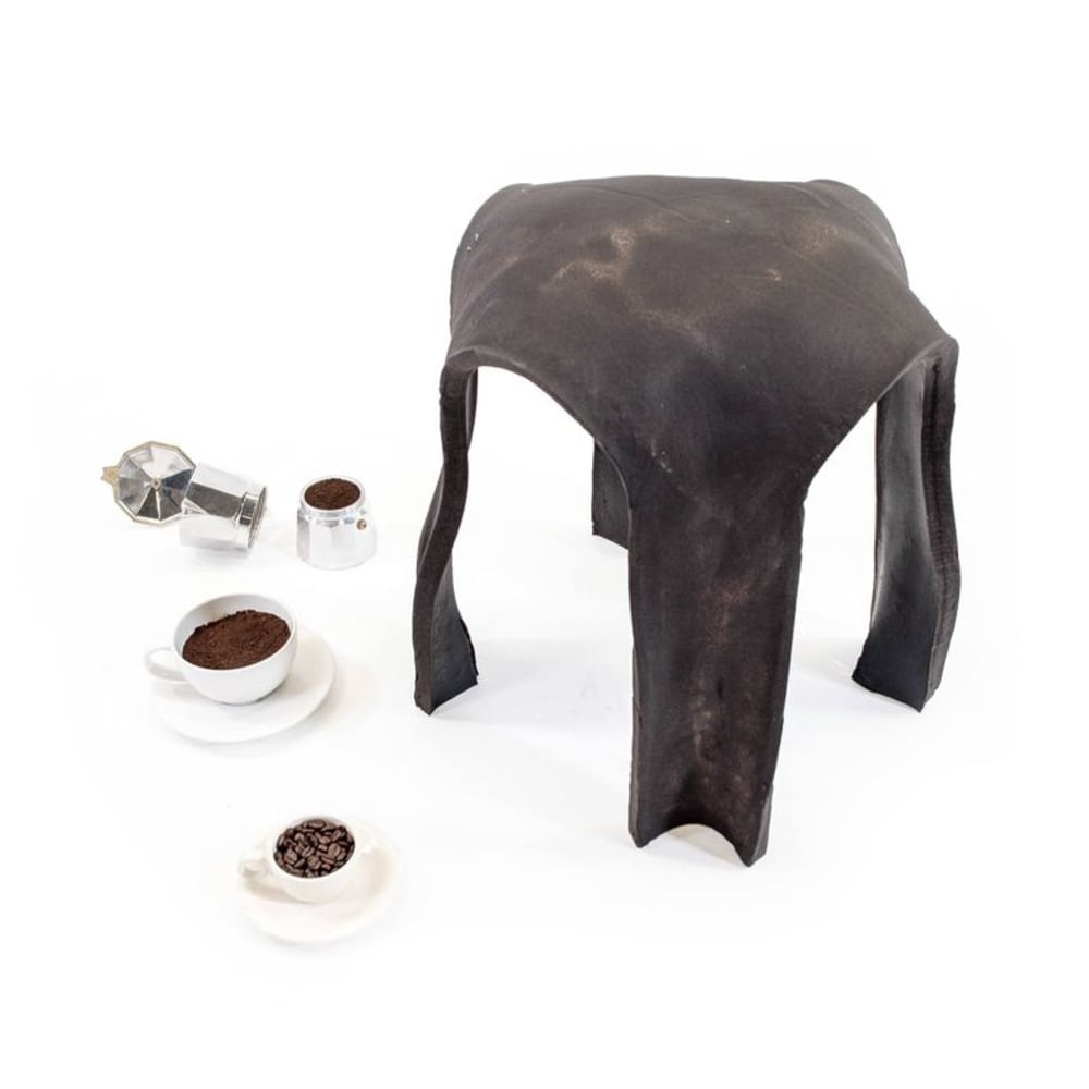 Circular stool made out of coffee grounds.<span class="sr-only"> (opened in a new window/tab)</span>