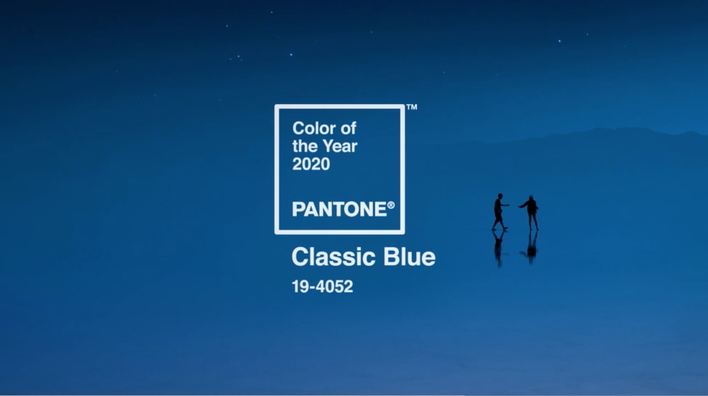 Blue landscape with two people holding their hands.<span class="sr-only"> (opened in a new window/tab)</span>