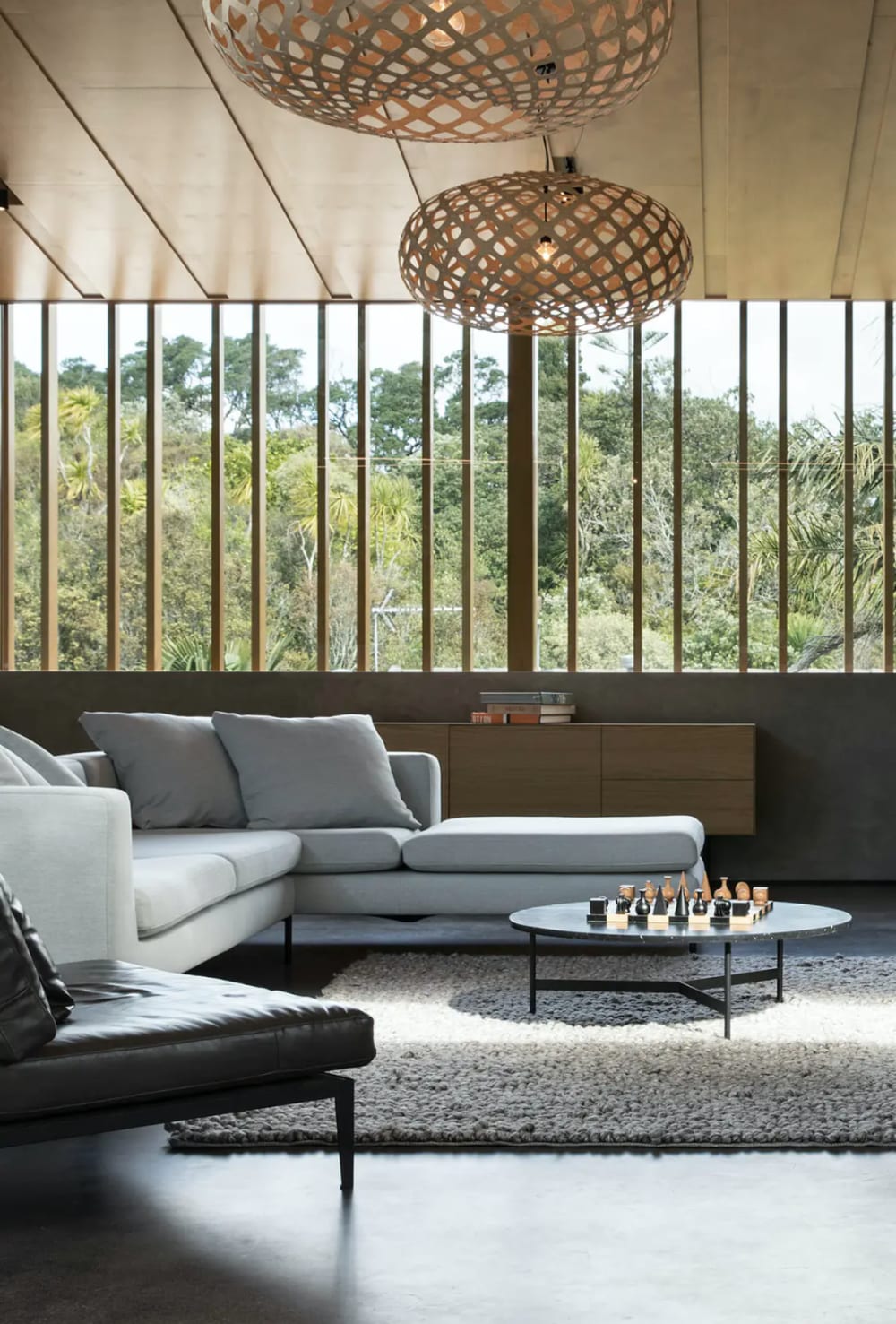 Covered patio overlooking greenery.<span class="sr-only"> (opened in a new window/tab)</span>