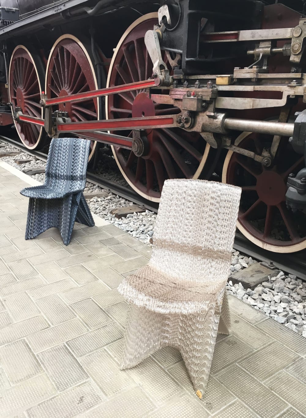 Recycled plastic chairs; clear and black.<span class="sr-only"> (opened in a new window/tab)</span>
