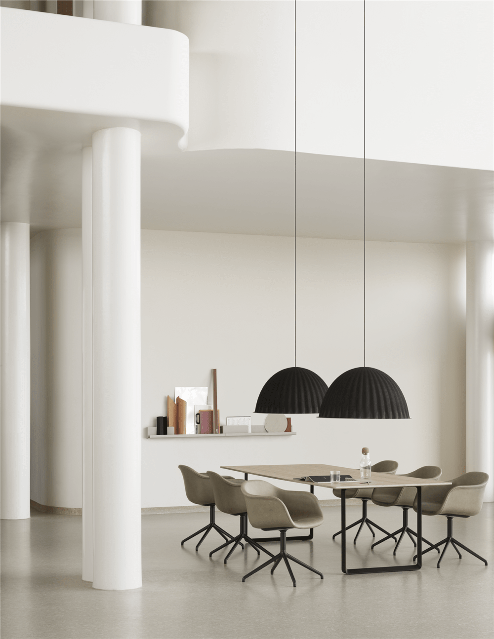 Minimal dining room with huge soudproofing pendant lights above the table.<span class="sr-only"> (opened in a new window/tab)</span>