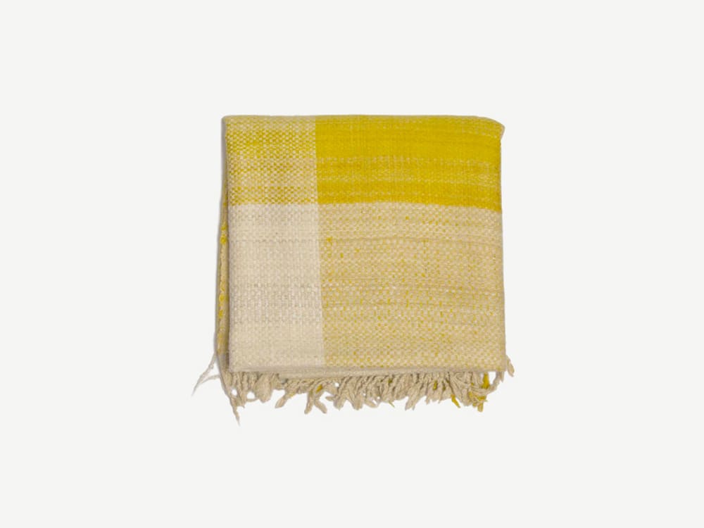 Blanket with yellow and beinge squares.<span class="sr-only"> (opened in a new window/tab)</span>