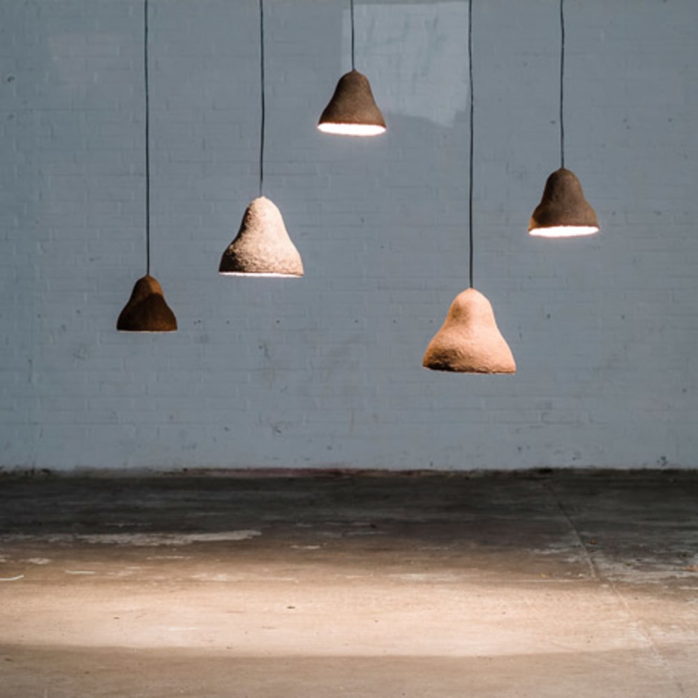An arrangement of pendant lamps made of seaweeds & paper styled in a room.<span class="sr-only"> (opened in a new window/tab)</span>