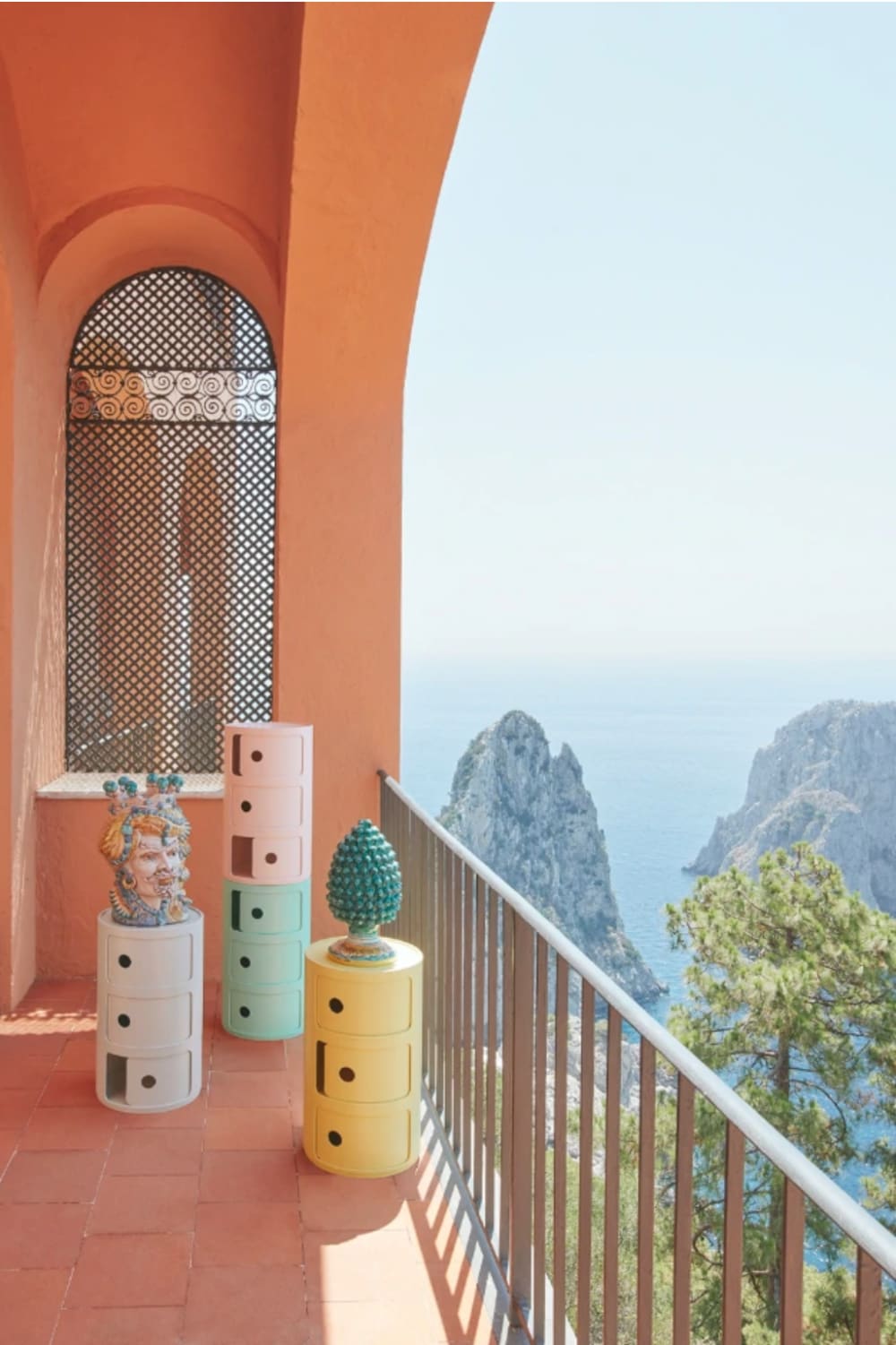 Storage units stacked on a balcony overlooking the sea.<span class="sr-only"> (opened in a new window/tab)</span>