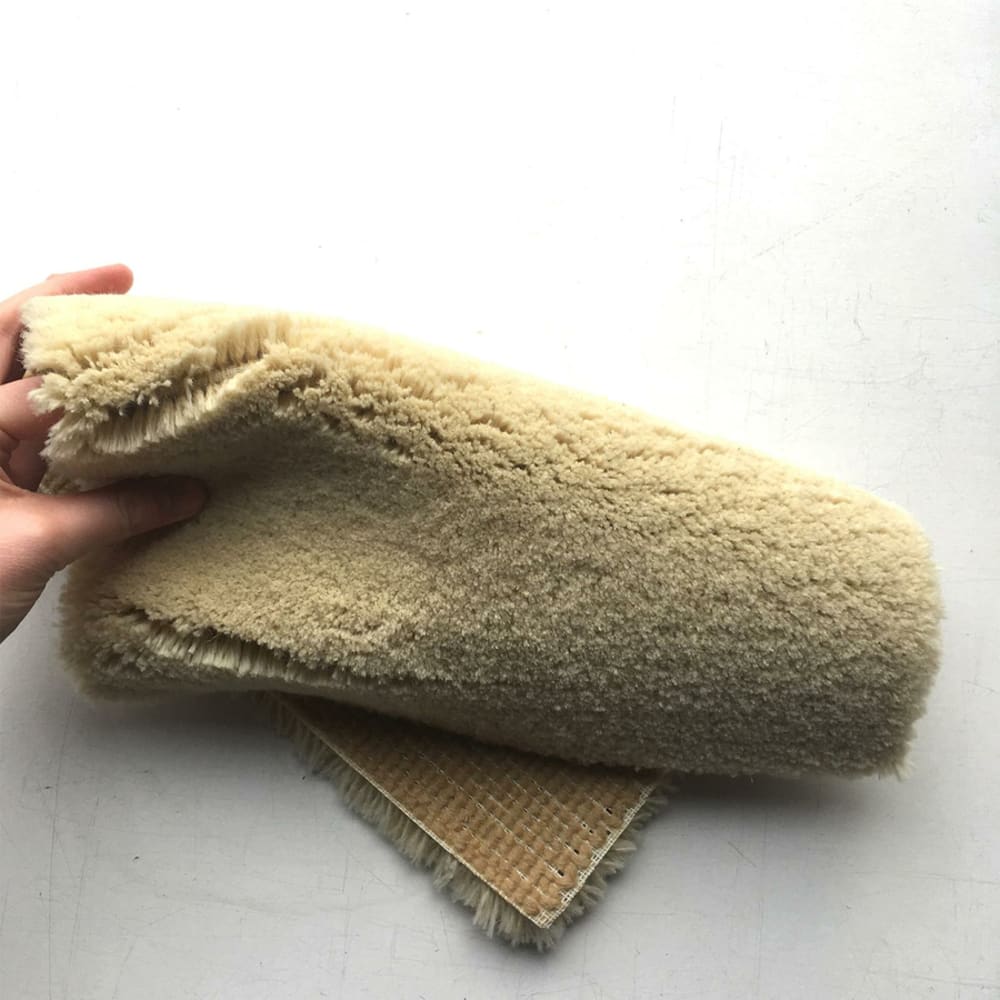 A piece of Robotuft rug folded.<span class="sr-only"> (opened in a new window/tab)</span>