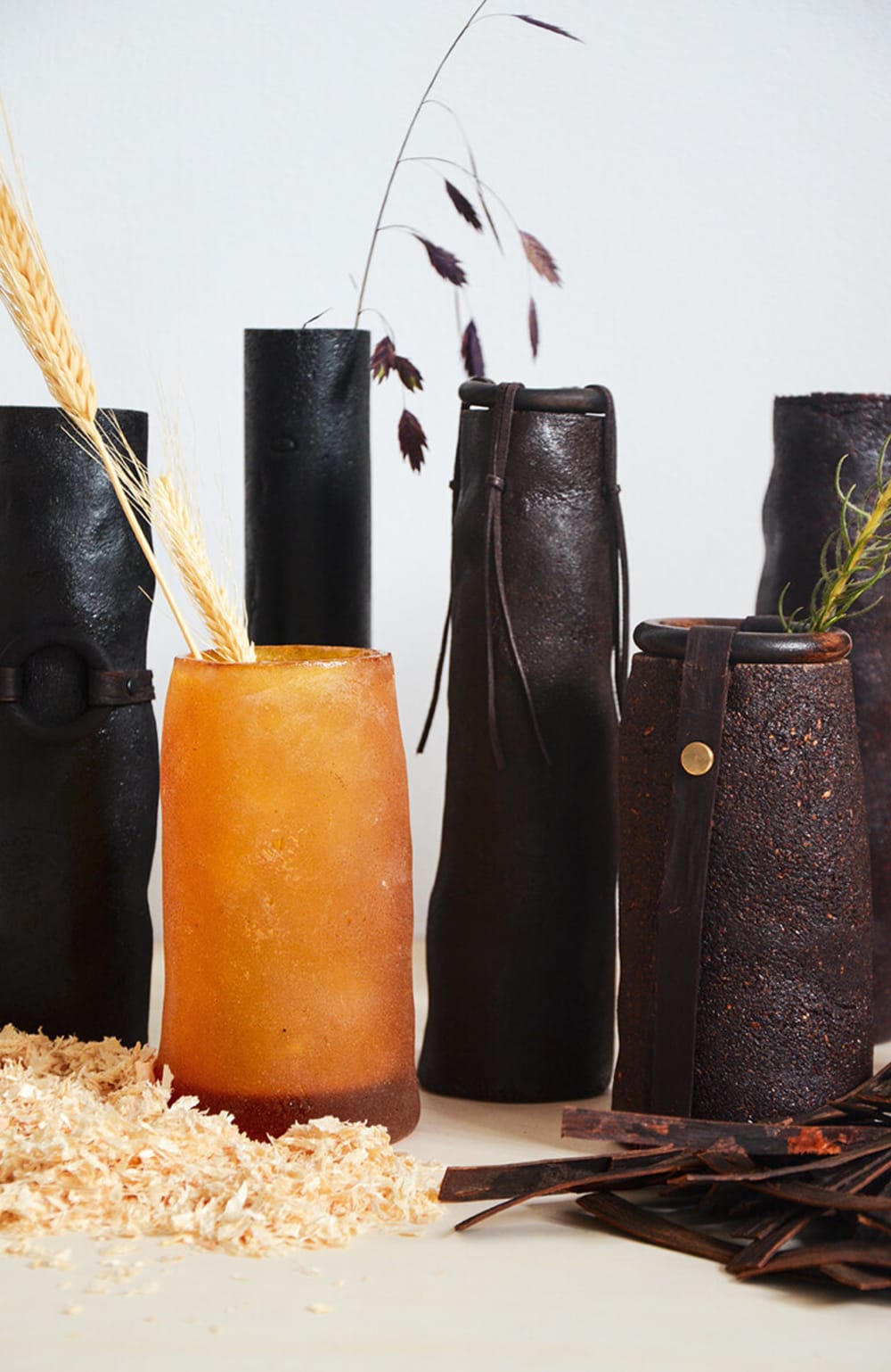 PineResin vases with dried flowers in them.<span class="sr-only"> (opened in a new window/tab)</span>