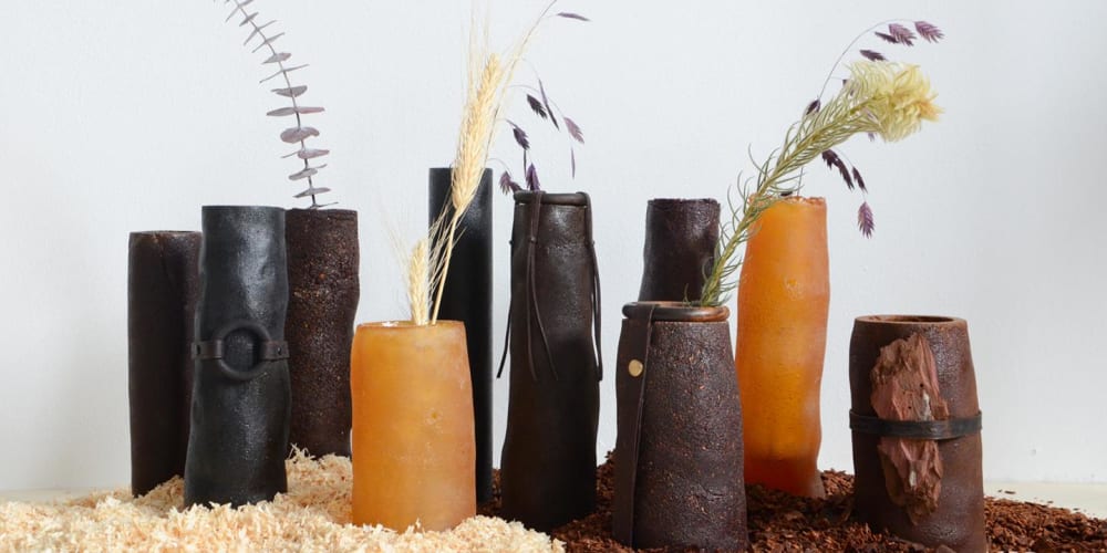 PineResin vases with dried flowers in them.<span class="sr-only"> (opened in a new window/tab)</span>