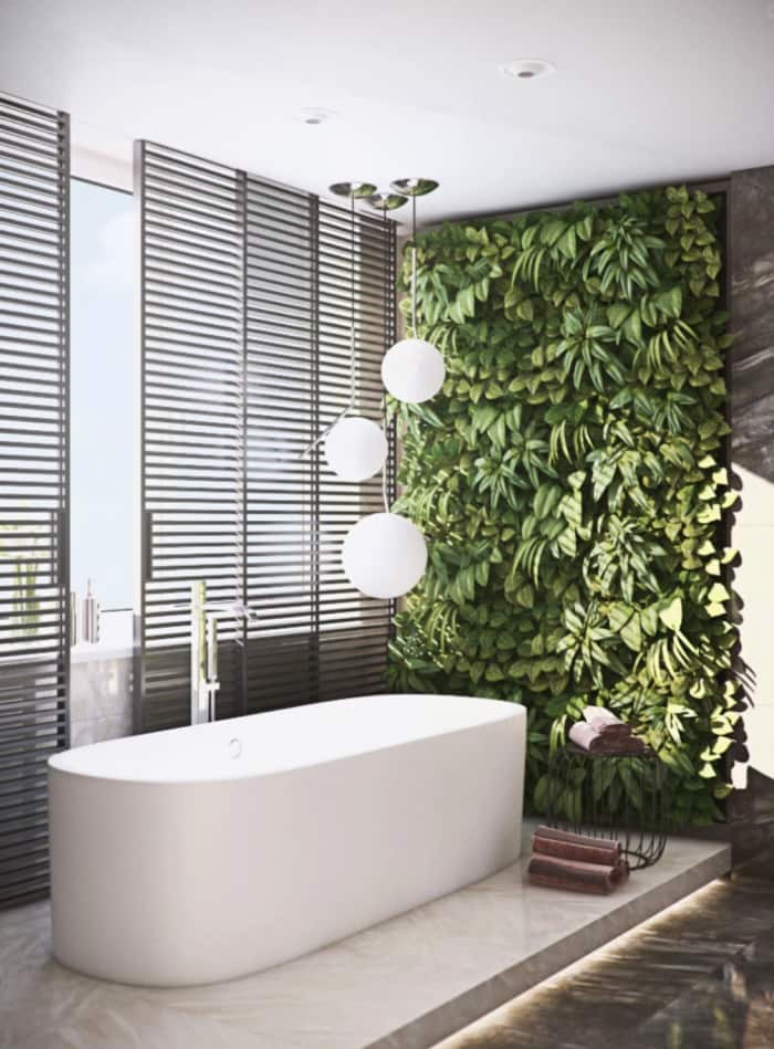 Modern bathroom with a garden wall design next to the bathtub. Modern bathroom with a garden wall design next to the bathtub.<span class="sr-only"> (opened in a new window/tab)</span>