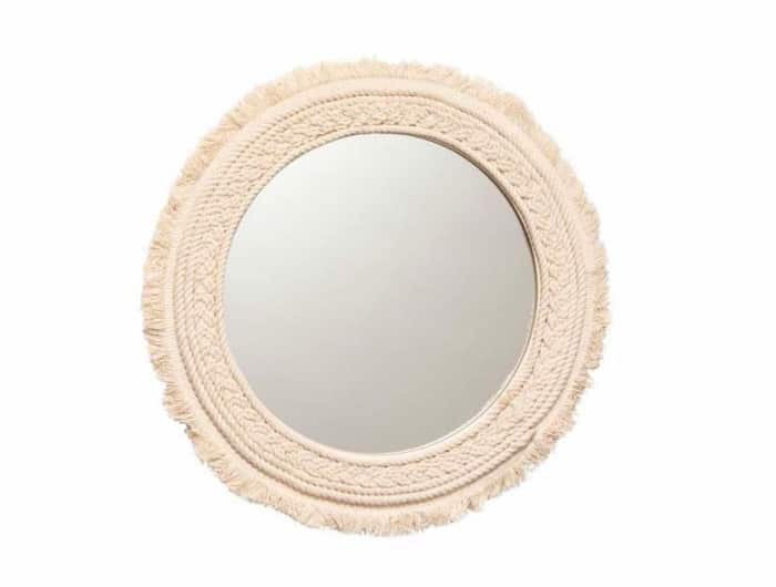 Fringe round mirror, by H&M Home.