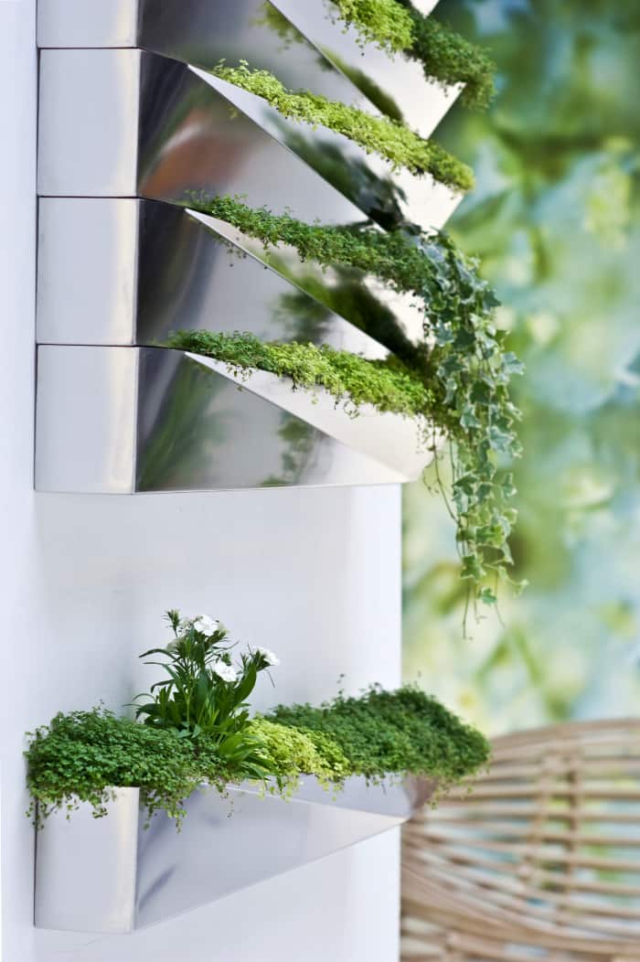 Close-up of the planter highlighting its reflective surface.