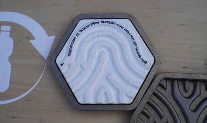 Close-up of a tile from Trashpresso, baked from plastic waste