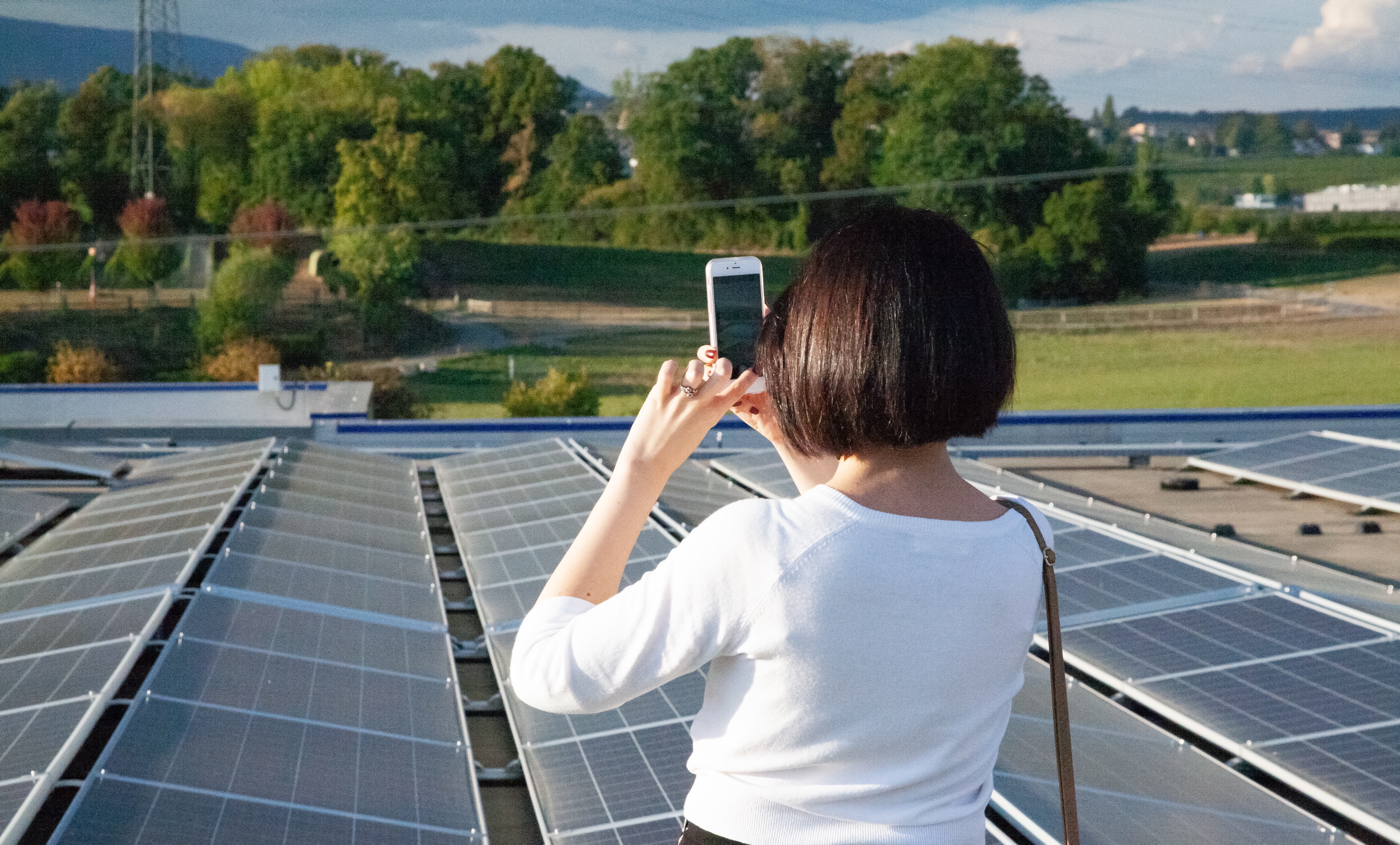 Me taking a photo of solar panels on the roof of IKEA's Aubonne, a champion store for sustainability.