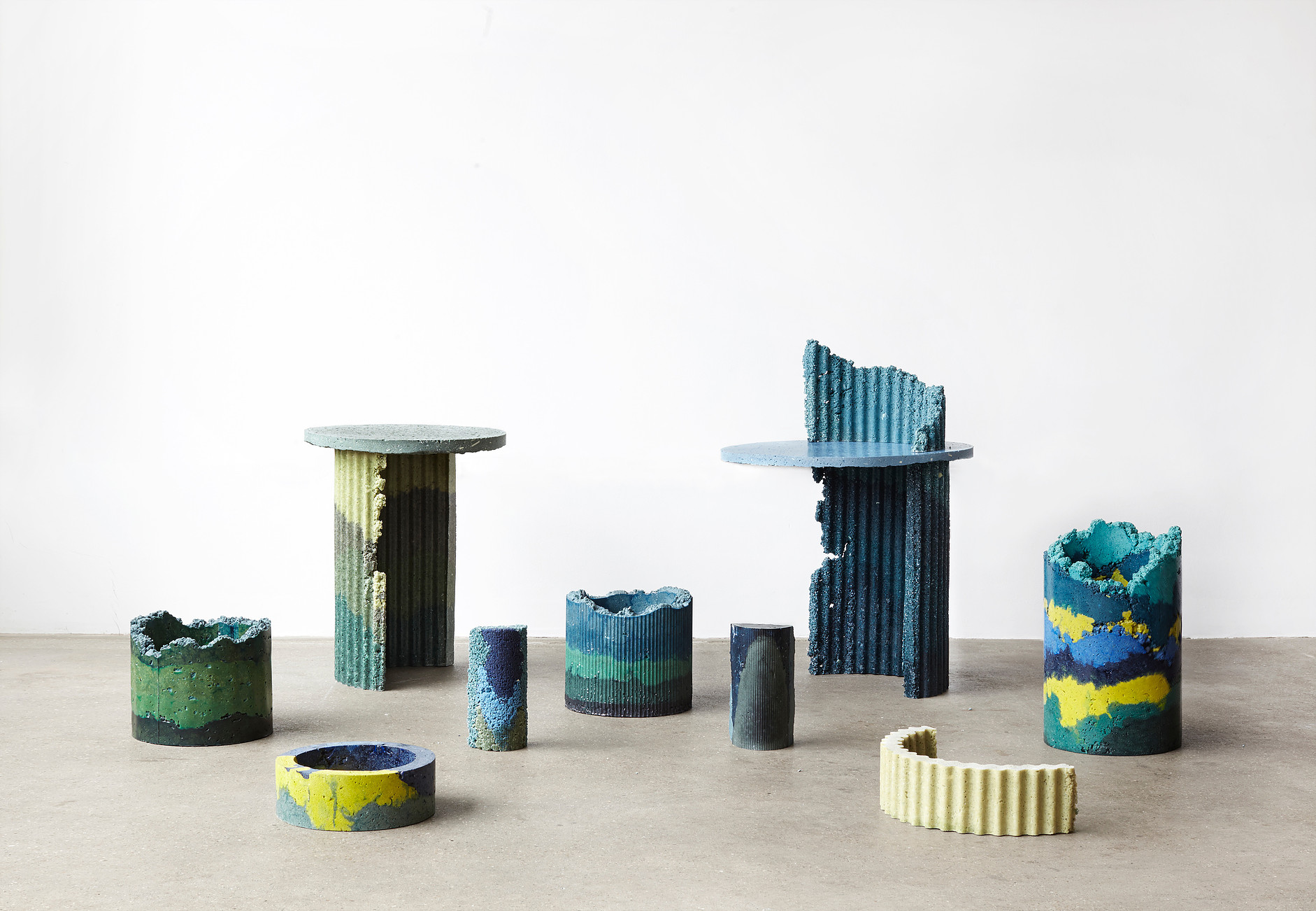 Charlotte Kidger recycled plastic vases and tables.