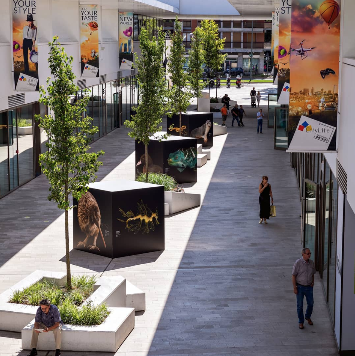 A closer outdoor view of CityLife shopping district, an example of biophilic design.