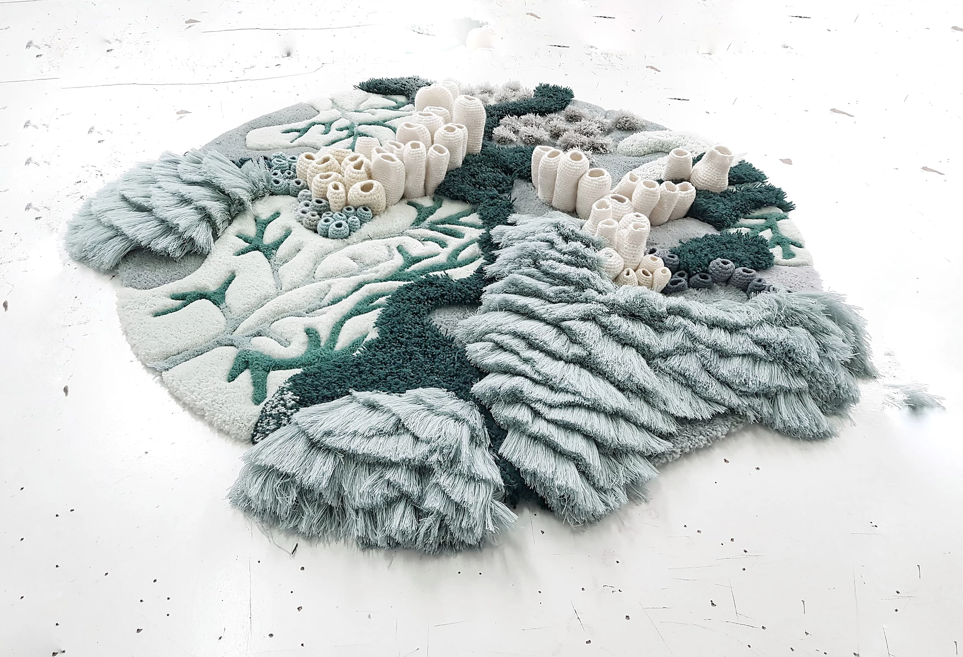 Textile art reproducing coral reefs - perfect for a biophilic design.
