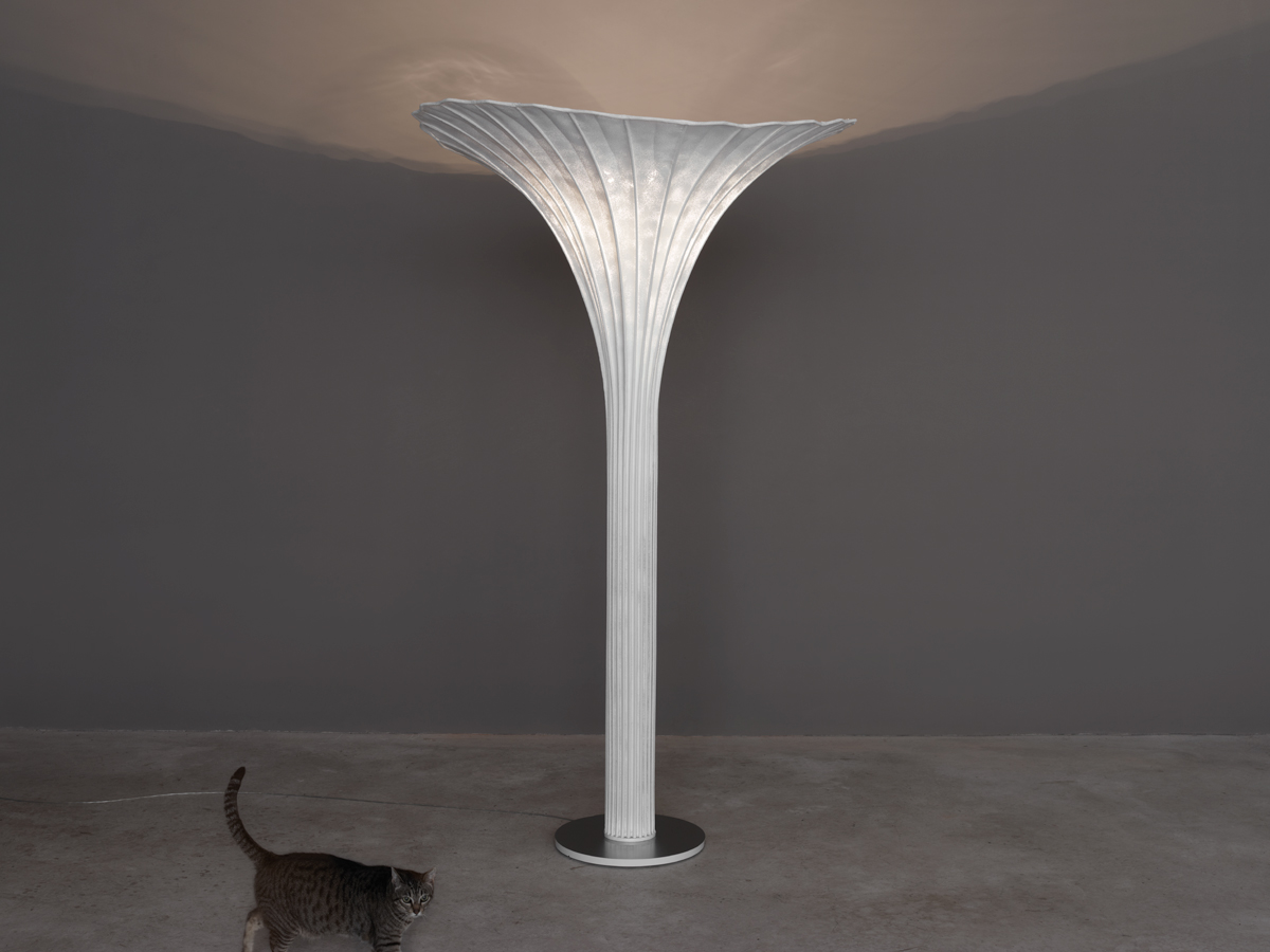 Floor lamp looking like a blooming flower bulb.