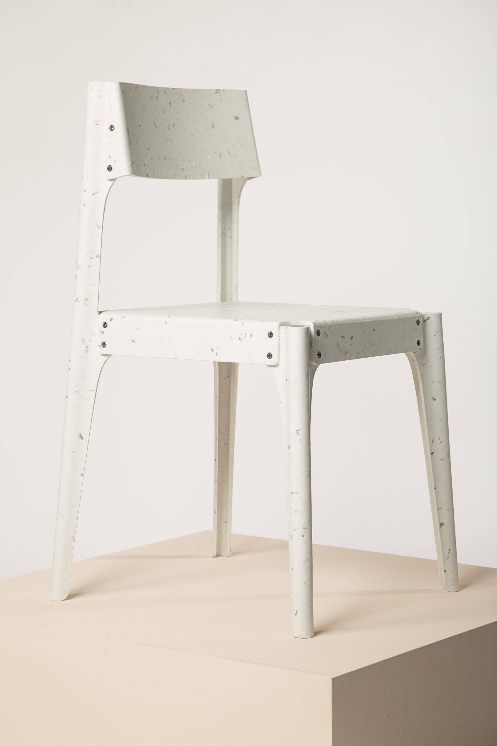 Recycled plastic chair winning the Guiltess Plastic Prize; one of the plastic recycling initiatives presented at Milan Design Week.