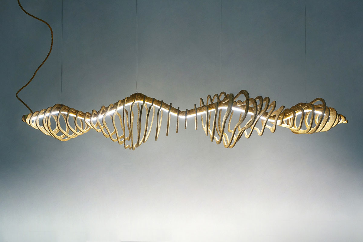 Circular design chadelier made of an organic waste-based biomaterial.