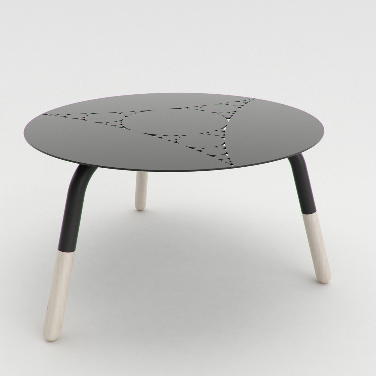 View from the side of a minimal coffee table with a fractal pattern laser cut on the metal base.
