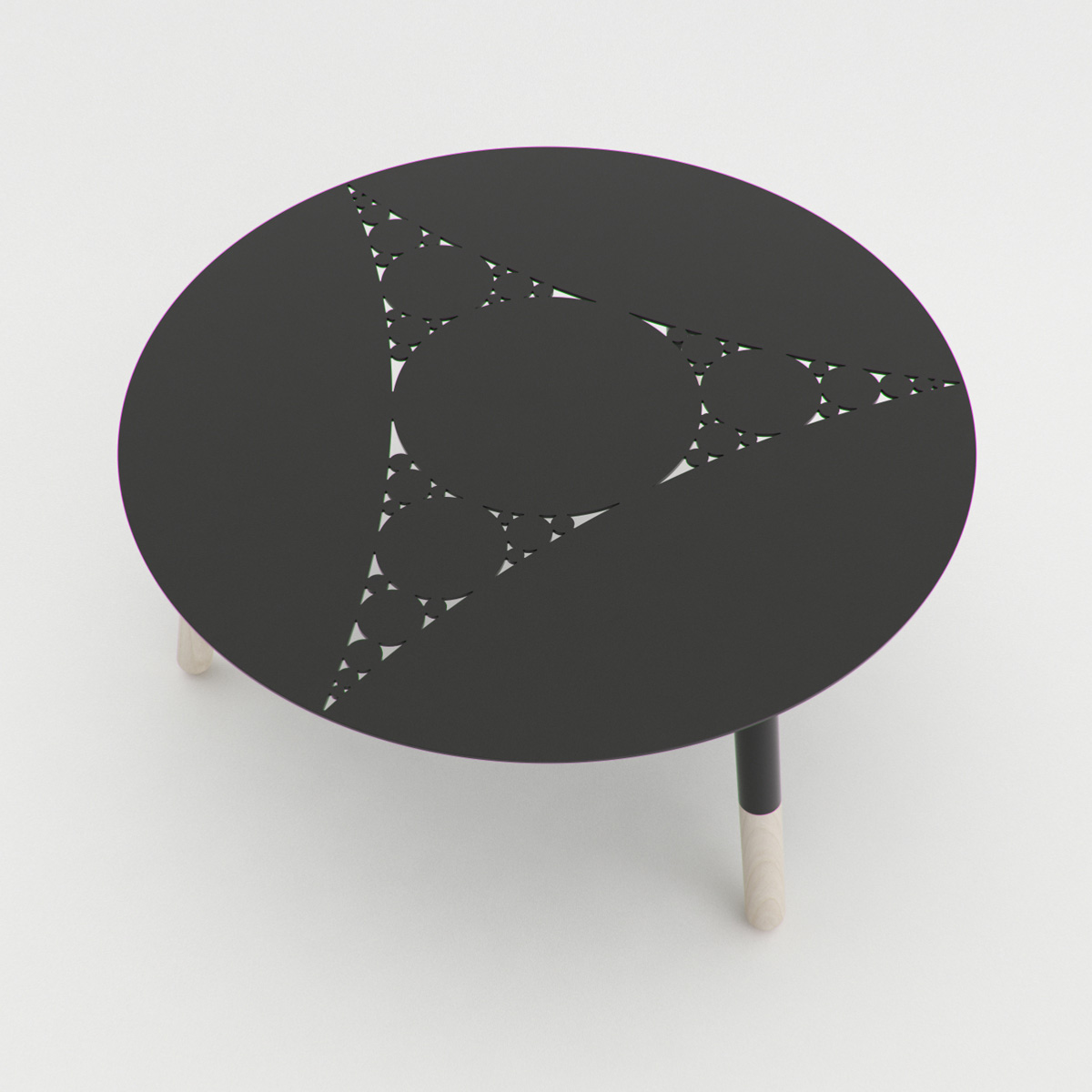 Minimal coffee table with a fractal pattern cut on the metal top.