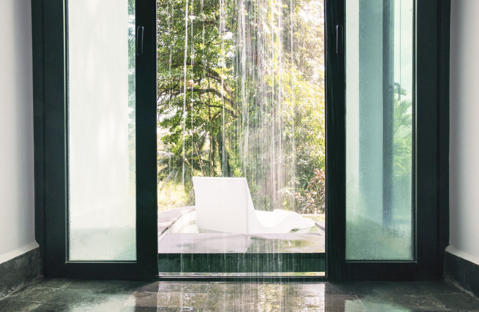 The pool's access to a rainfall walk-in shower.