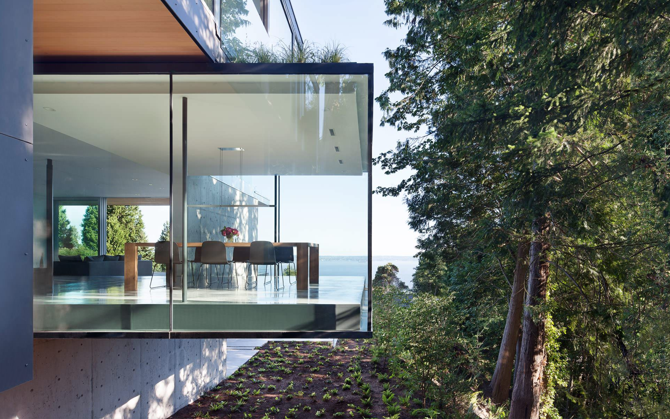 Home with cantilevered dining room.