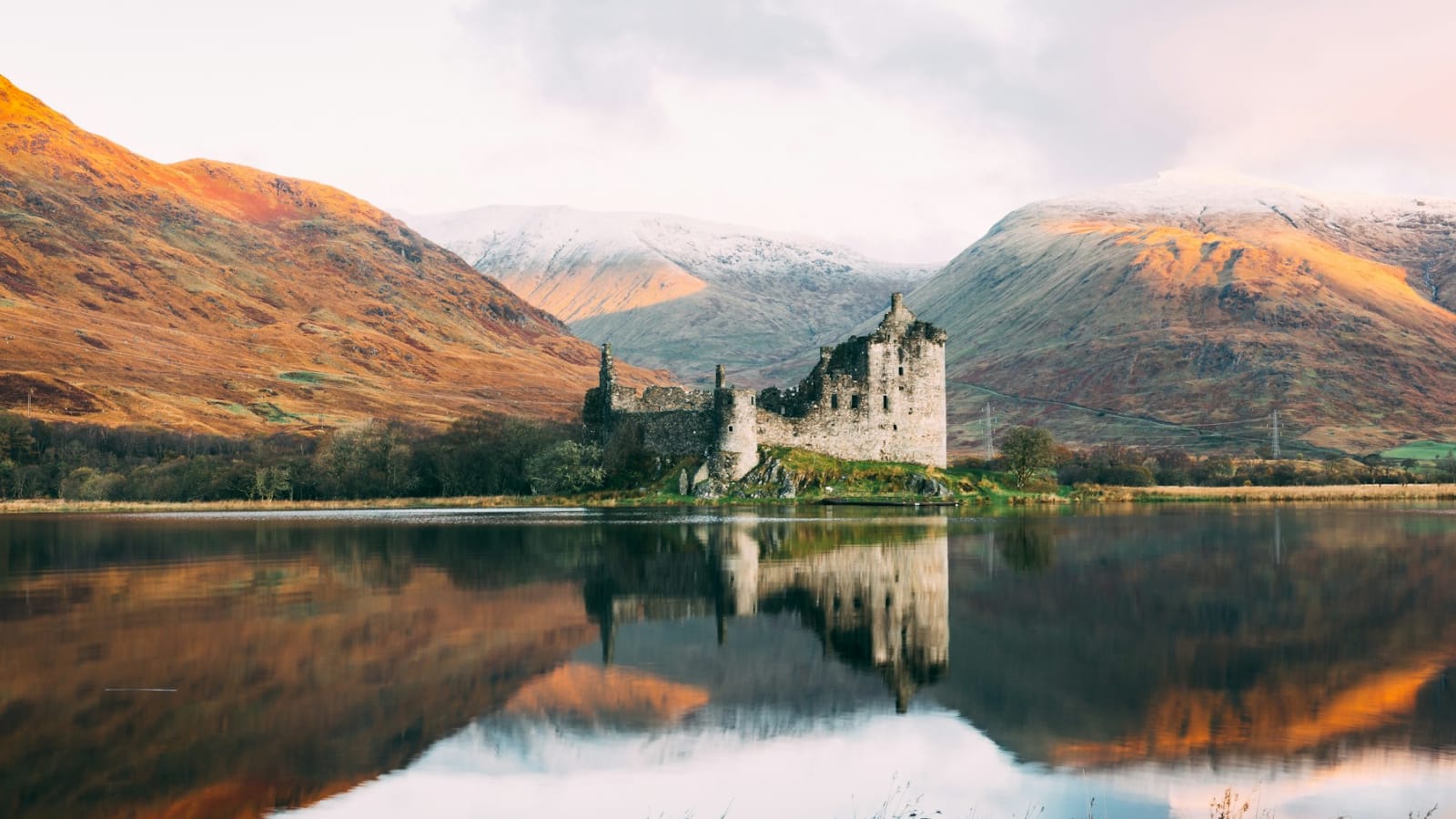 A scenic Scotland landscape representing Edinburgh, the Highlands, and a carefully paced route