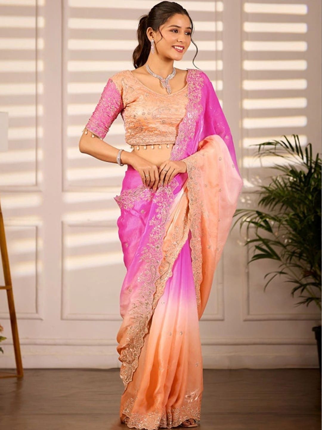 Peach Ombre Fendi Satin Embroidered Saree with Stitched Net Back Blouse