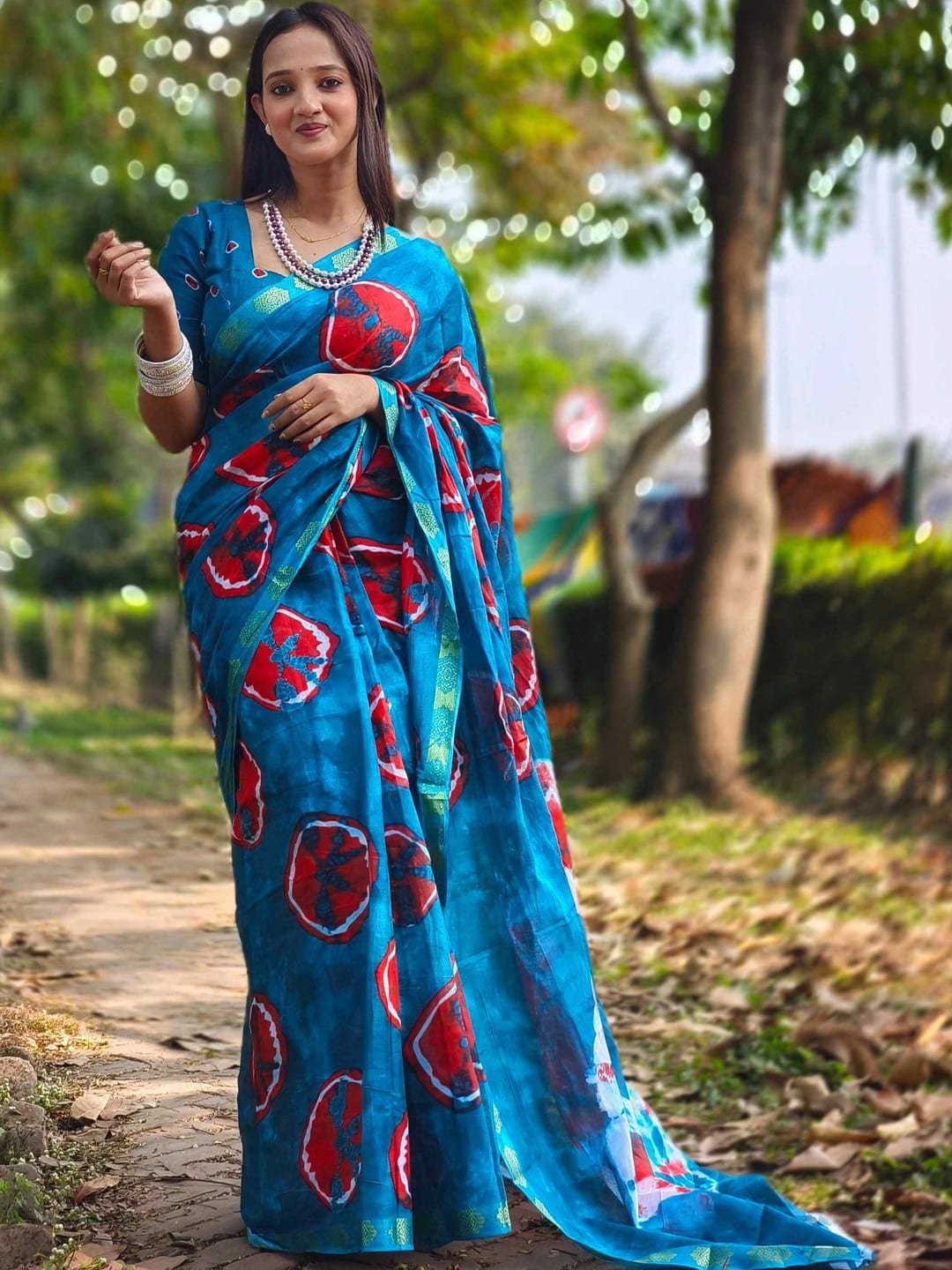 Blue Tie & Dye Print Saree with Woven Border