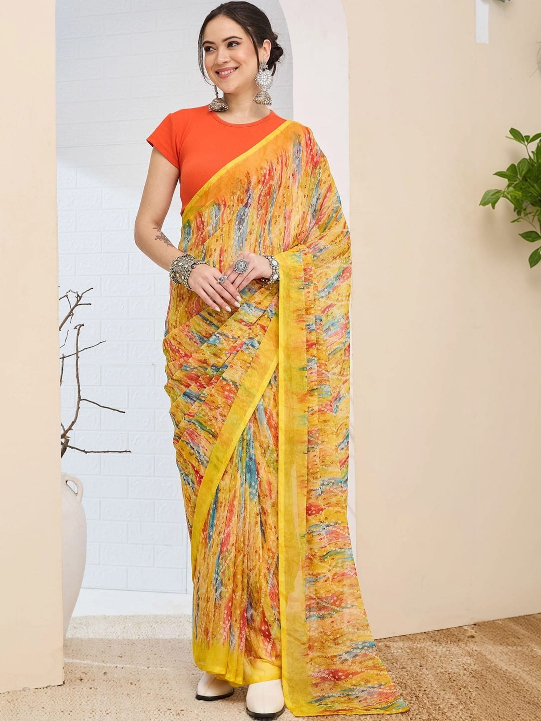 Yellow Abstract Printed saree with Woven Design Border