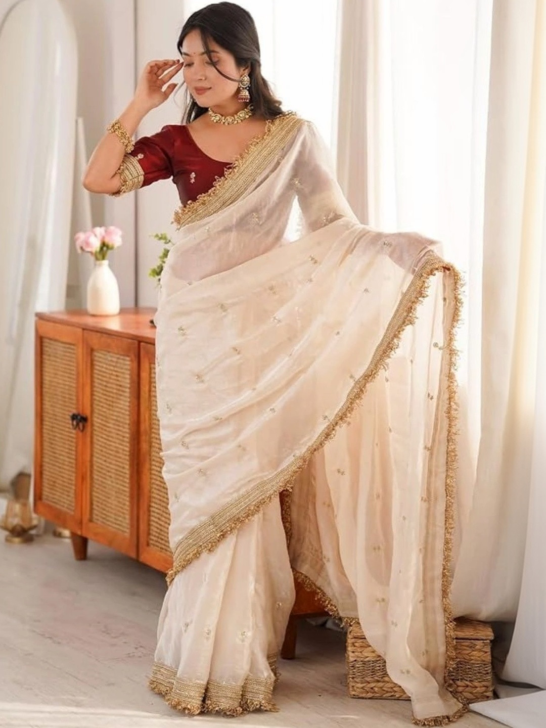 Off White Shimmer Satin Saree with Embroidered Border & Embellishments