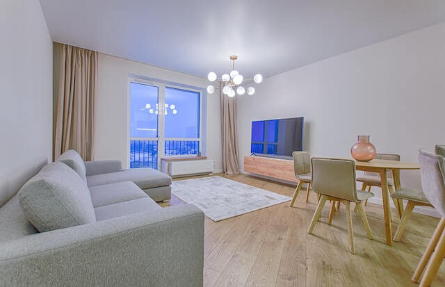 soundproofed apartment walls & ceiling and brown wooden floor