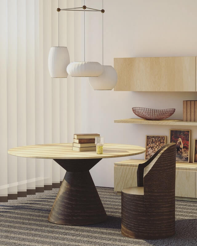 round beige and brown wooden table and chair on carpets floor