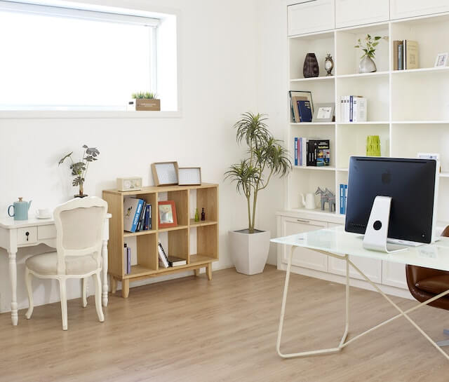 brown wooden organizer and bookshelves