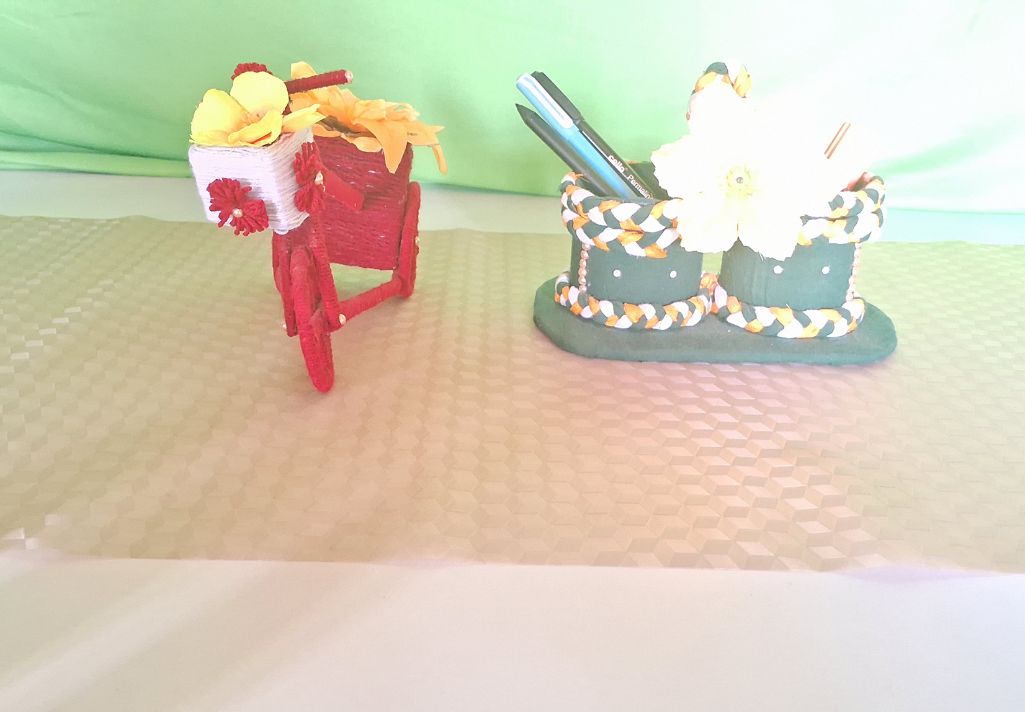 This delightful creation features a charming bicycle and beautiful flowers, perfect for any occasion.