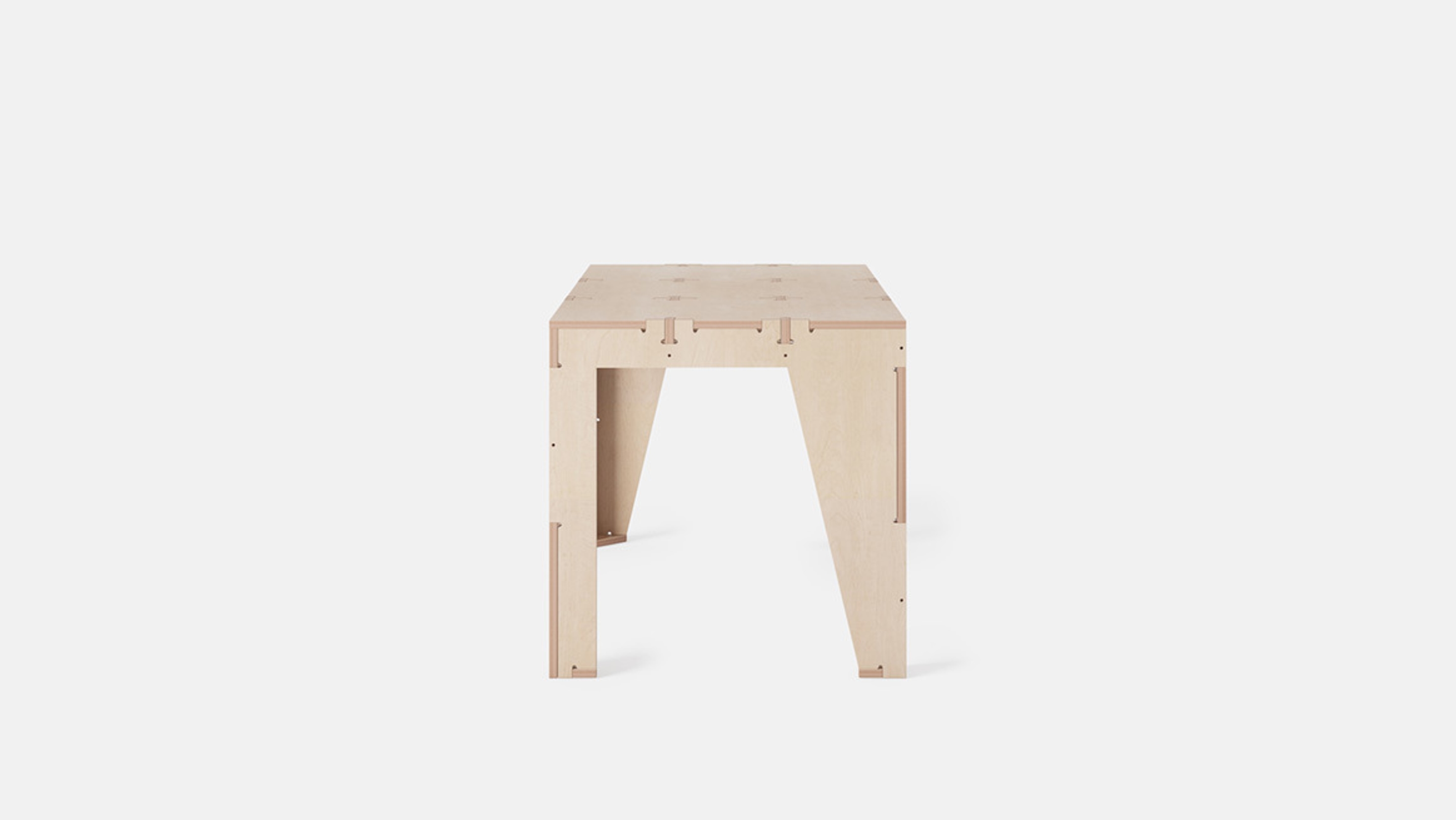 Side view of One to Several Table, Birch Plywood
