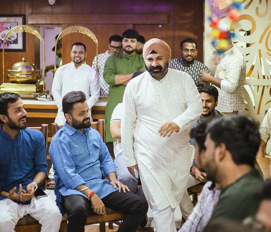 The team together at a festive office celebration