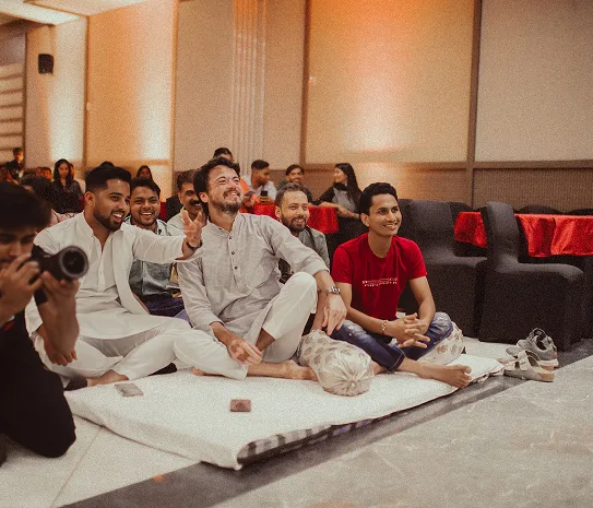 Colleagues gathered in the office lounge