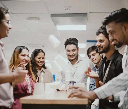 Colleagues celebrating around a table
