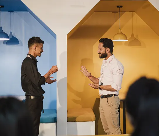 Two colleagues in conversation