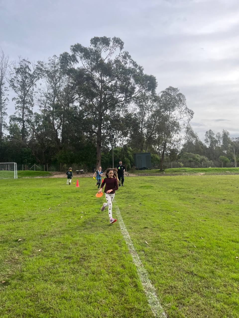 Juego de movimiento y cooperación en la canchita