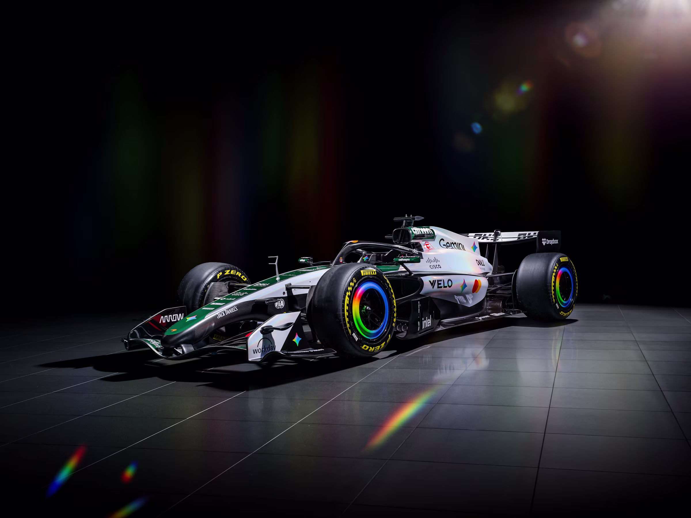Courtesy: Liberty Media, F1-  MCL40 in retro white and green livery inspired by the 1966 McLaren M2B
