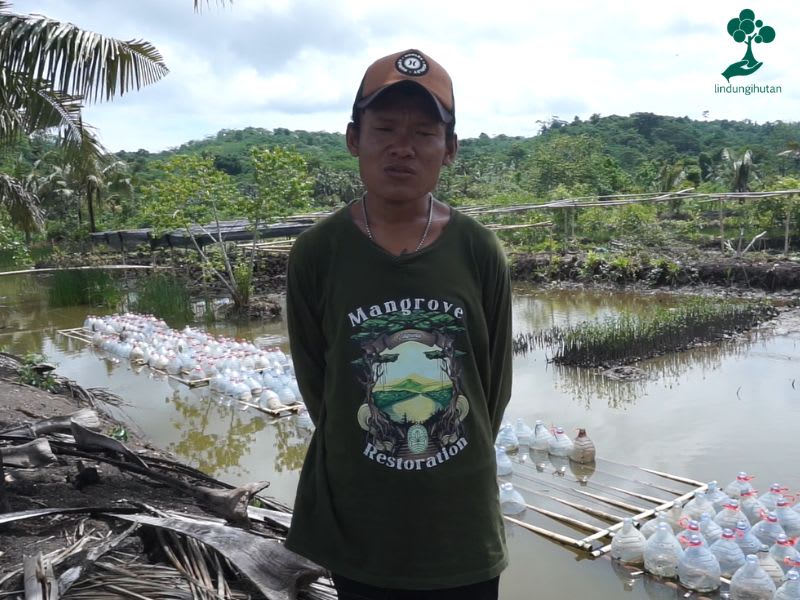 Andrea at the mangrove nursery in Kampung Laut, Cilacap.