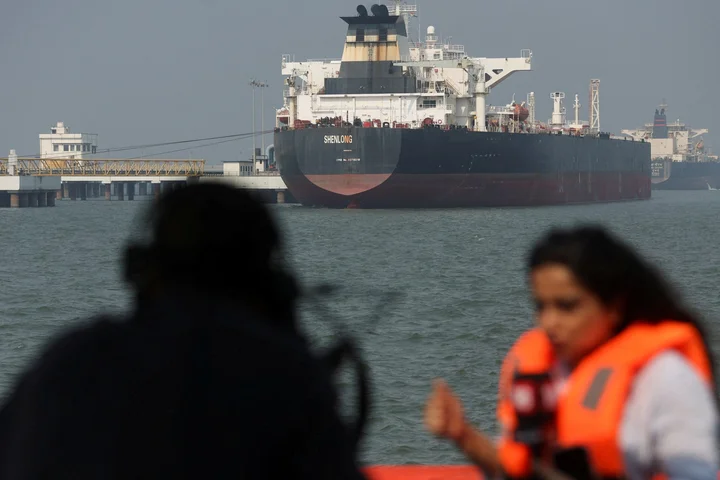 India lowers fuel taxes, says rumours of lockdown ‘completely false’