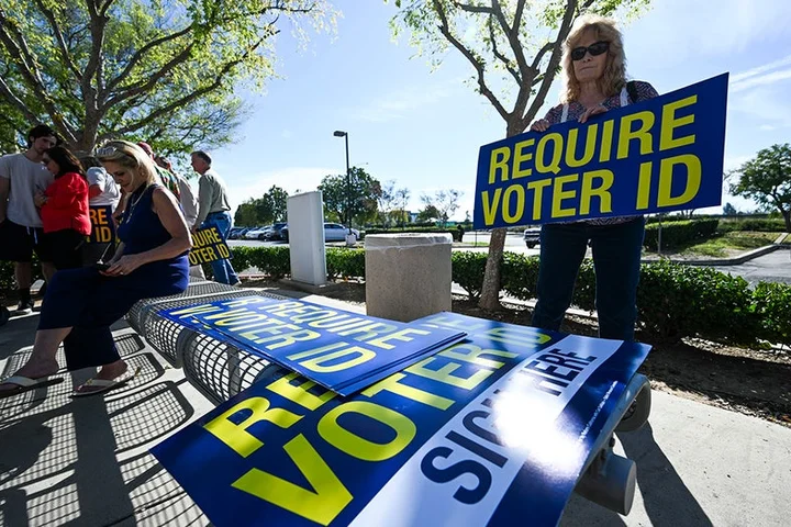 Obama-appointed judge reverses course, rules voter ID law isn't discriminatory in GOP win