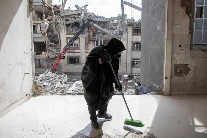 Guns in the streets as US, Israel intensify month-long attacks across Iran